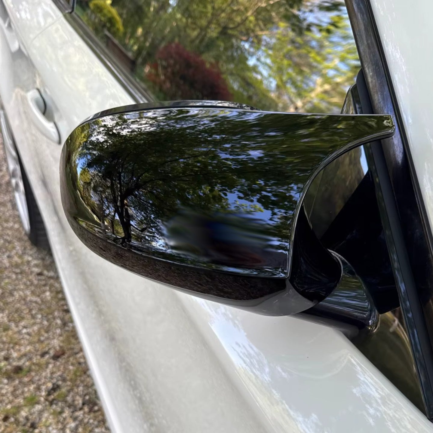 Coques de rétroviseurs type M Performance noires brillantes pour BMW Série 1 E87 et E81 (2004 - 2009)