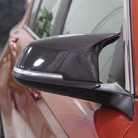 Coques de rétroviseurs BMW Série 1 F20 type M Perfomance carbone (2011-2017) BMW Série 1 F20 - Coques de rétroviseurs type M Performance Fibre de Carbone (2011 - 2017)